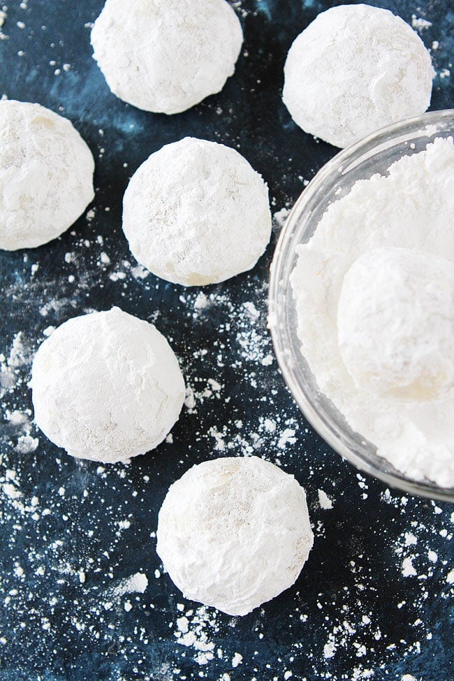 Mexican Wedding Cookies are buttery pecan cookies rolled in confectioners sugar, making them look just like snowballs. They are the perfect Christmas cookie! #cookies #baking #Christmas #Christmascookies #holidays #dessert 